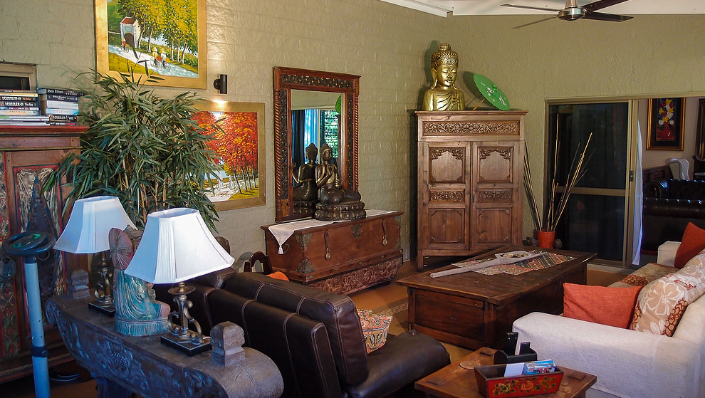 Touch of Bali - TV in corner cupboard